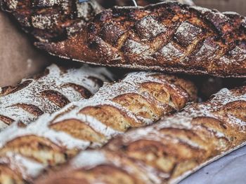 Close-up of fresh baked baguette at bakery