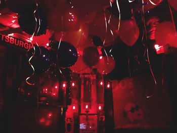 Close-up of illuminated lights at night