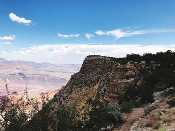 Scenic view of rocky mountains against sky