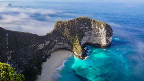 High angle view of rock formation in sea