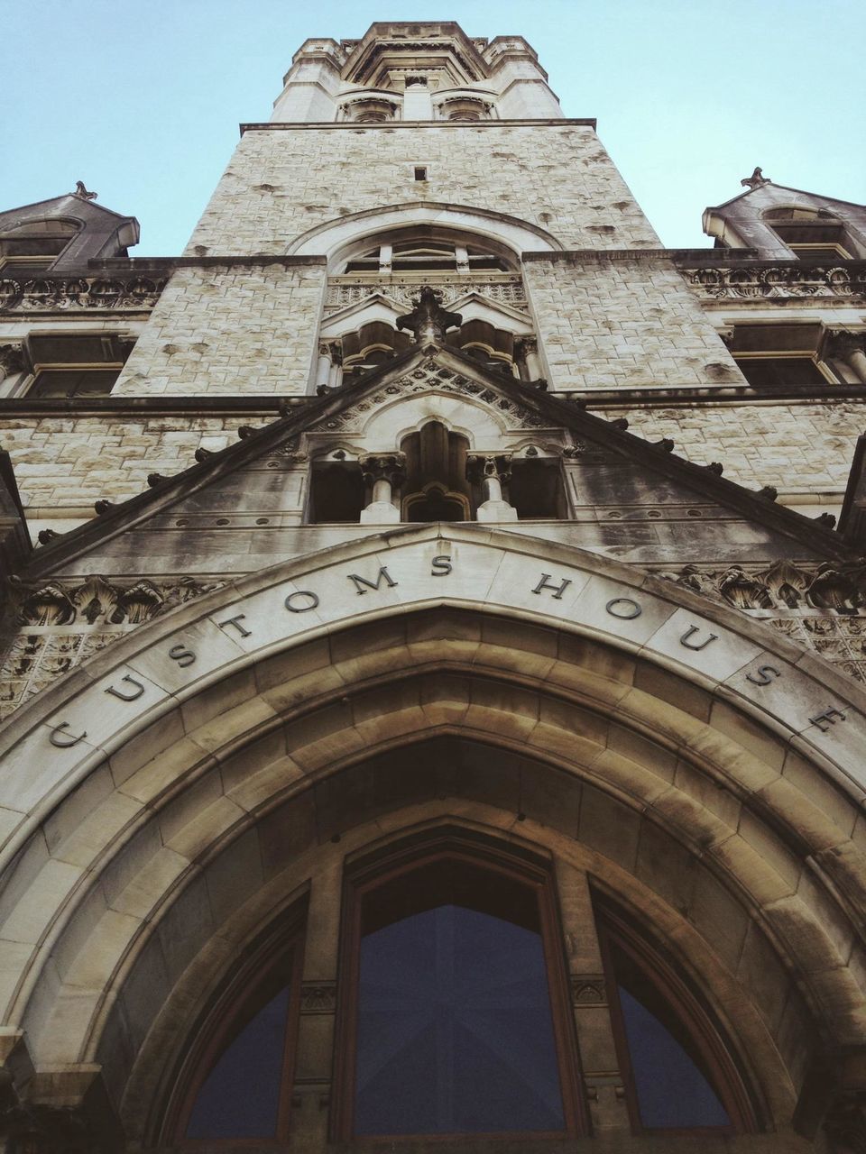 architecture, building exterior, built structure, low angle view, church, clear sky, religion, history, place of worship, arch, travel destinations, spirituality, famous place, blue, old, cathedral, facade, day