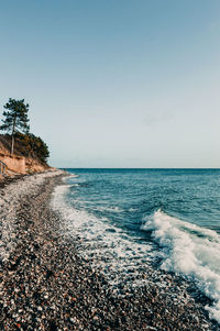 Scenic view of sea against clear sky