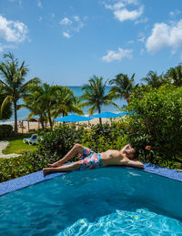 Man swimming in pool