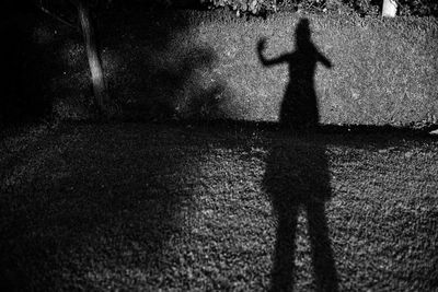 Shadow of person on cross