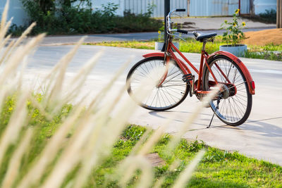 Bicycle parked on field