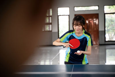 Young man playing tennis