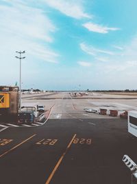Airport runway against blue sky