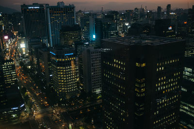 Illuminated cityscape at night