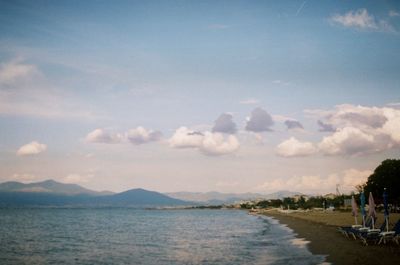 Scenic view of sea against cloudy sky