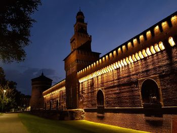 Low angle view of historical building at night