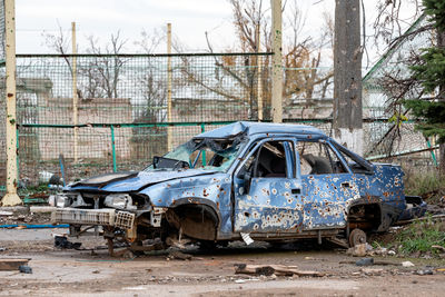 Abandoned car on street