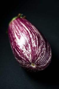 Close-up of watermelon against black background