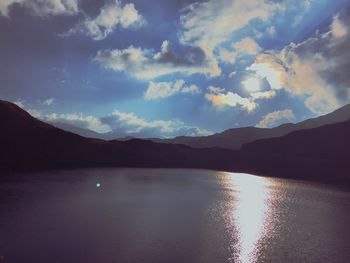 Scenic view of mountains against sky during sunset