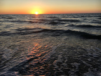 Scenic view of sea against sky during sunset