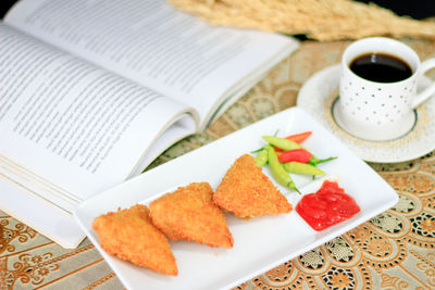 High angle view of breakfast served on table