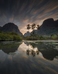 Scenic view of lake against sky during sunset
