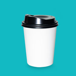 Close-up of coffee cup against white background