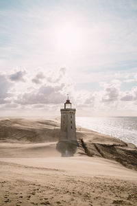 Scenic view of rubjerg knude lighthouse at seashore