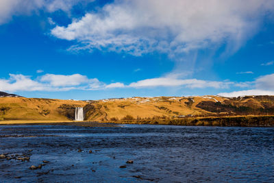 Scenic view of land against sky