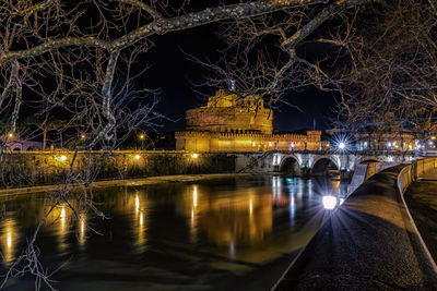 River by illuminated hadrian tomb at night