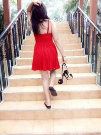 Woman walking on steps