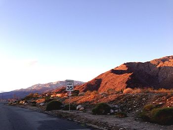 View of road against clear blue sky