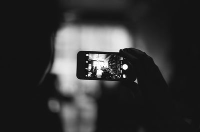 Man photographing with smart phone
