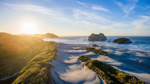 Scenic view of sea against sky during sunset