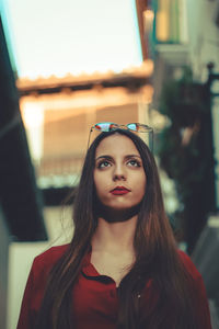 Portrait of young woman looking away