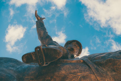 Low angle view of statue against the sky