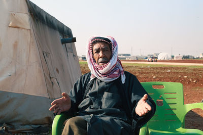 Portrait of a syrian old man living inside the refugee camp.