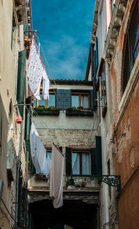 Low angle view of buildings against sky