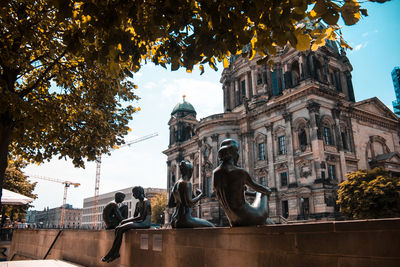 Low angle view of statue of historic building