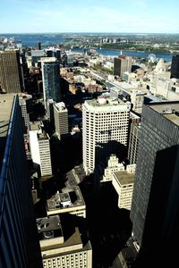 High angle view of buildings in city against sky