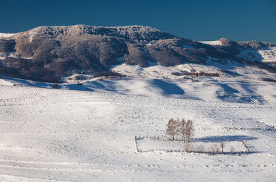 Scenic view of mountains against clear sky