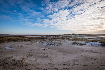 Scenic view of beach against sky