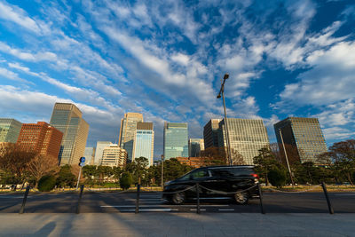 Modern buildings in city against sky