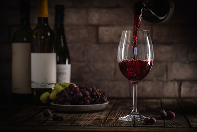 Close-up of wineglass on table