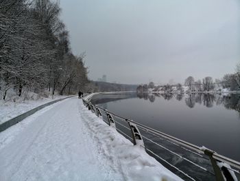 Panoramic view of lake against sky during winter