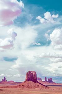Rock formations on landscape against sky