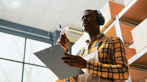 Young man using digital tablet