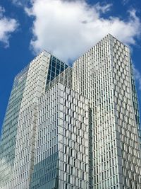 Low angle view of skyscrapers against sky