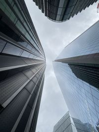 Low angle view of modern buildings against sky