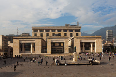 Group of people in front of historical building