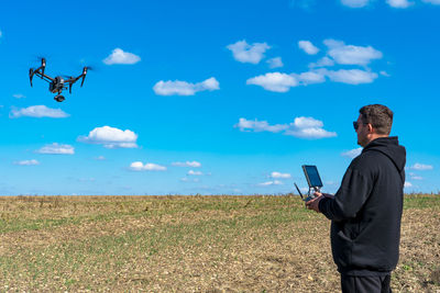 The pilot controls a professional drone inspire 2