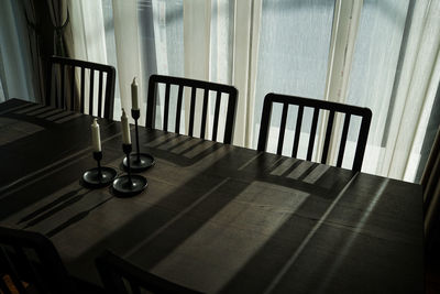 Empty chairs and table at home