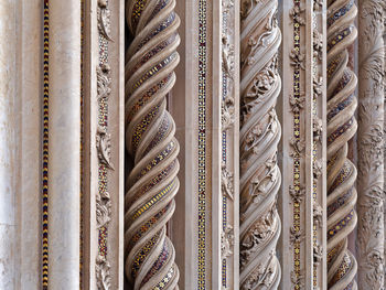 Full frame shot of carvings on columns