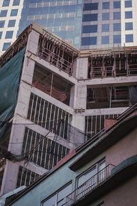 Low angle view of modern building against sky