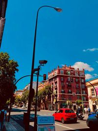 View of street against blue sky