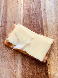 High angle view of bread on cutting board